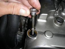 Removing valve cover bolt - click for larger image